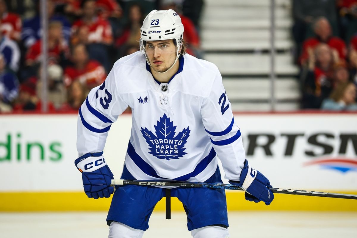 Feb 4, 2025; Calgary, Alberta, CAN; Toronto Maple Leafs left wing Matthew Knies (23) against the Calgary Flames during the third period at Scotiabank Saddledome. Mandatory Credit: Sergei Belski-Imagn Images