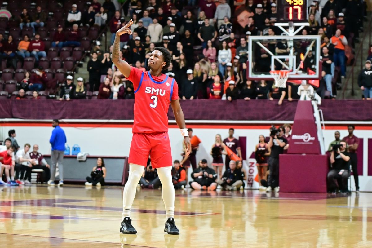 Feb 5, 2025; Blacksburg, Virginia, USA;  Southern Methodist Mustangs guard Chuck Harris (3) celebrates a three-point basket against the Virginia Tech Hokies during the first half at Cassell Coliseum. Mandatory Credit: Brian Bishop-Imagn Images