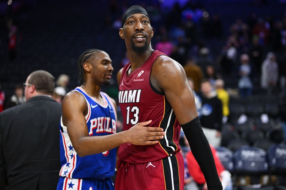 Feb 5, 2025; Philadelphia, Pennsylvania, USA; Miami Heat center Bam Adebayo (13) looks on with Philadelphia 76ers guard Tyrese Maxey (0) after the game at Wells Fargo Center. Mandatory Credit: Kyle Ross-Imagn Images