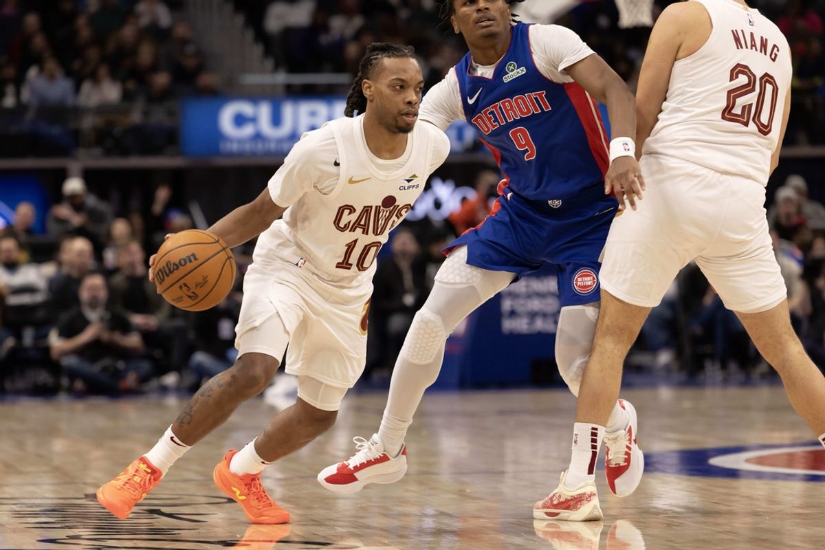 Feb 5, 2025; Detroit, Michigan, USA; Cleveland Cavaliers guard Darius Garland (10) moves the ball up court against the Detroit Pistons during the second half at Little Caesars Arena. Mandatory Credit: David Reginek-Imagn Images