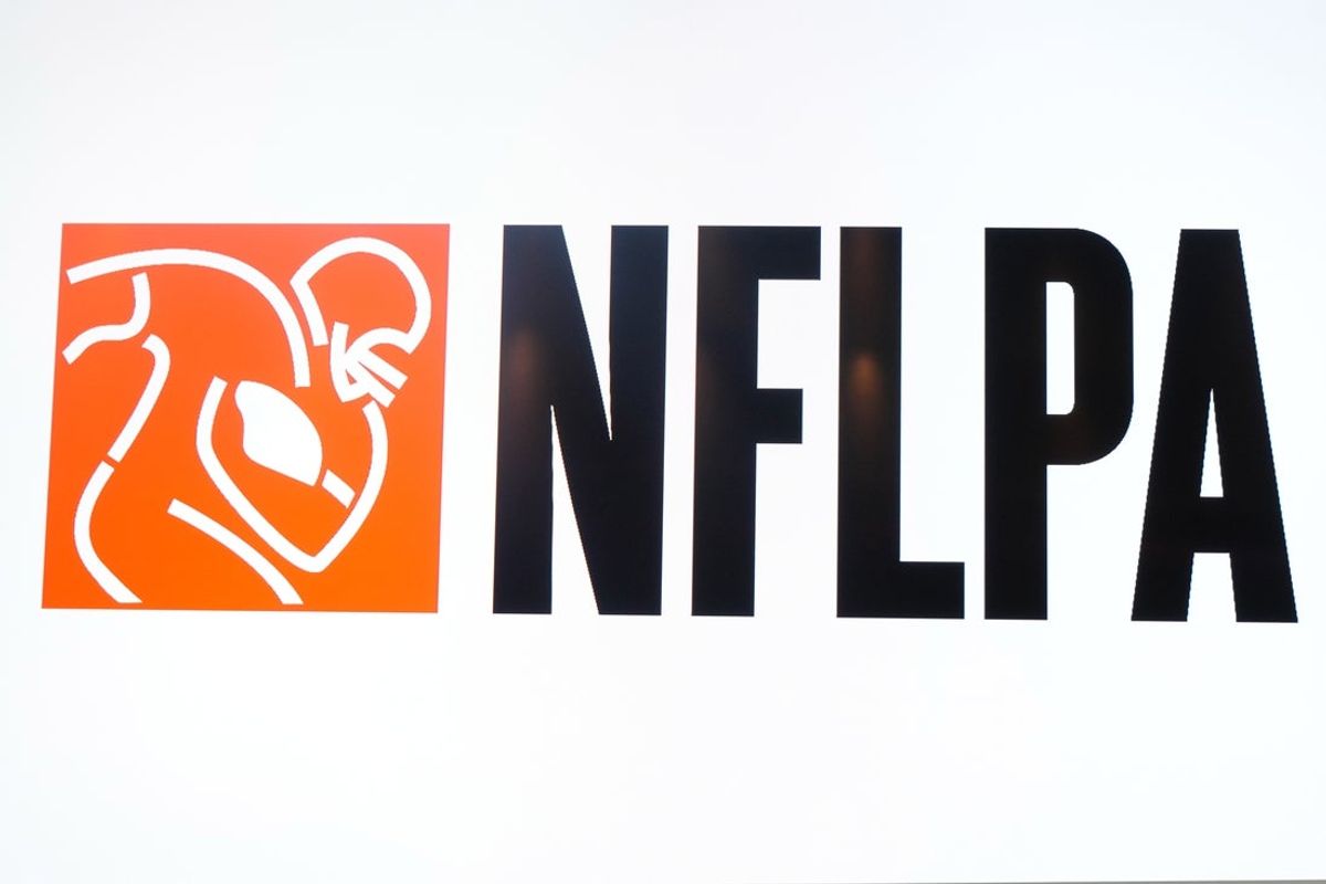 Feb 5, 2025; New Orleans, LA, USA; The NFLPA logo at press conference at the Super Bowl LIX media center at the  Ernest N. Morial Convention Center. Mandatory Credit: Kirby Lee-Imagn Images