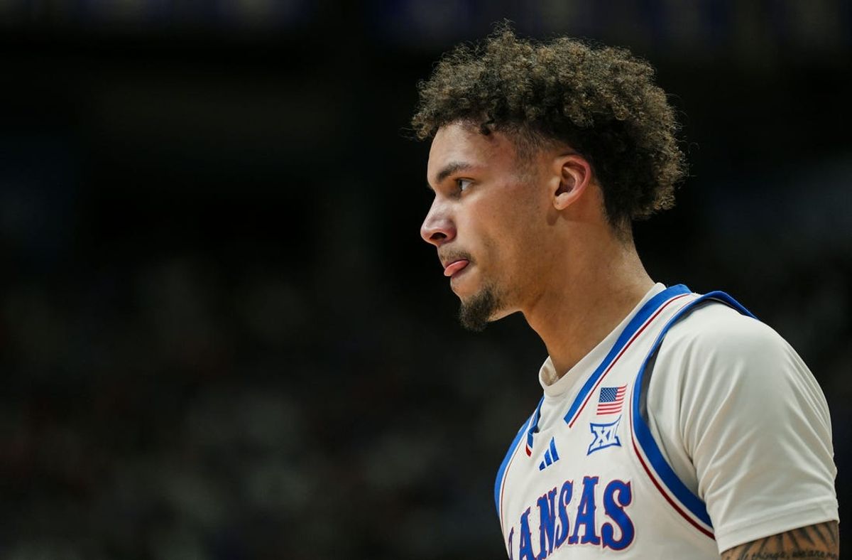 Feb 3, 2025; Lawrence, Kansas, USA; Kansas Jayhawks guard Zeke Mayo (5) reacts during the first half against the Iowa State Cyclones at Allen Fieldhouse. Mandatory Credit: Jay Biggerstaff-Imagn Images