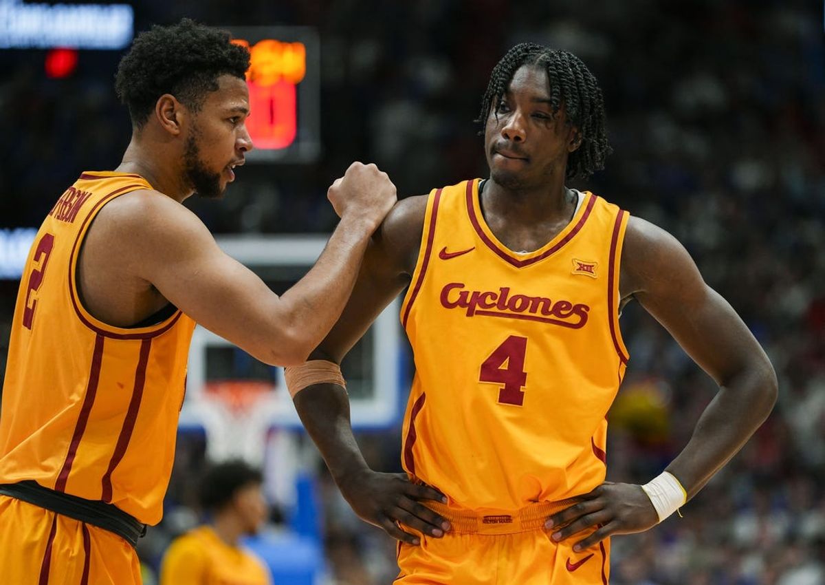 Feb 3, 2025; Lawrence, Kansas, USA; Iowa State Cyclones forward Joshua Jefferson (2) talks with guard Demarion Watson (4) during the second half against the Kansas Jayhawks at Allen Fieldhouse. Mandatory Credit: Jay Biggerstaff-Imagn Images