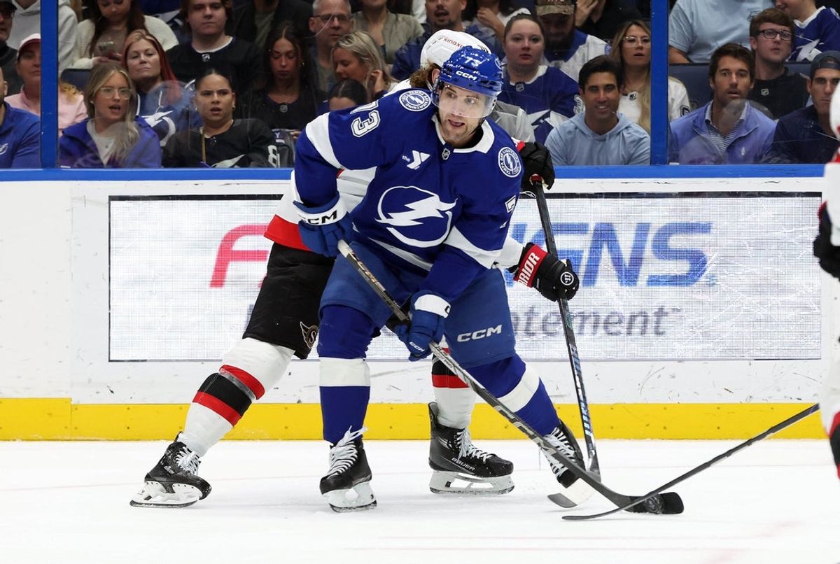 Feb 6, 2025; Tampa, Florida, USA; Tampa Bay Lightning left wing Conor Sheary (73) passes against Ottawa Senators right wing Adam Gaudette (81) during the first period at Amalie Arena. Mandatory Credit: Kim Klement Neitzel-Imagn Images