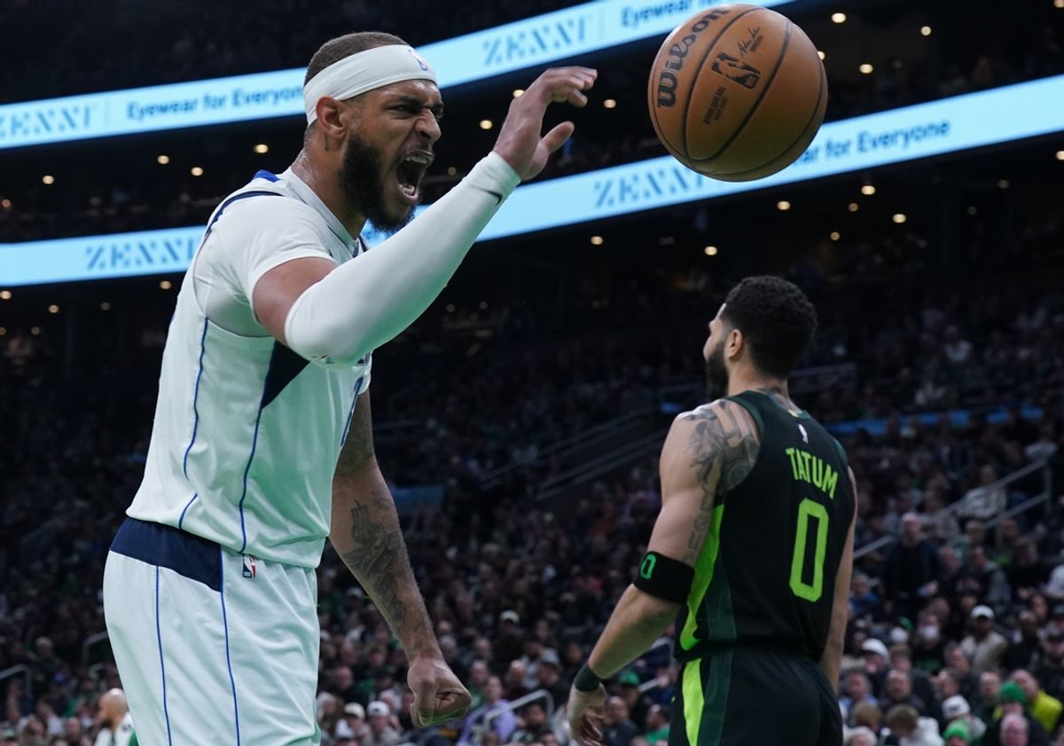 Feb 6, 2025; Boston, Massachusetts, USA; Dallas Mavericks center Daniel Gafford (21) reacts to a play against the Boston Celtics in the second quarter at TD Garden. Mandatory Credit: David Butler II-Imagn Images
