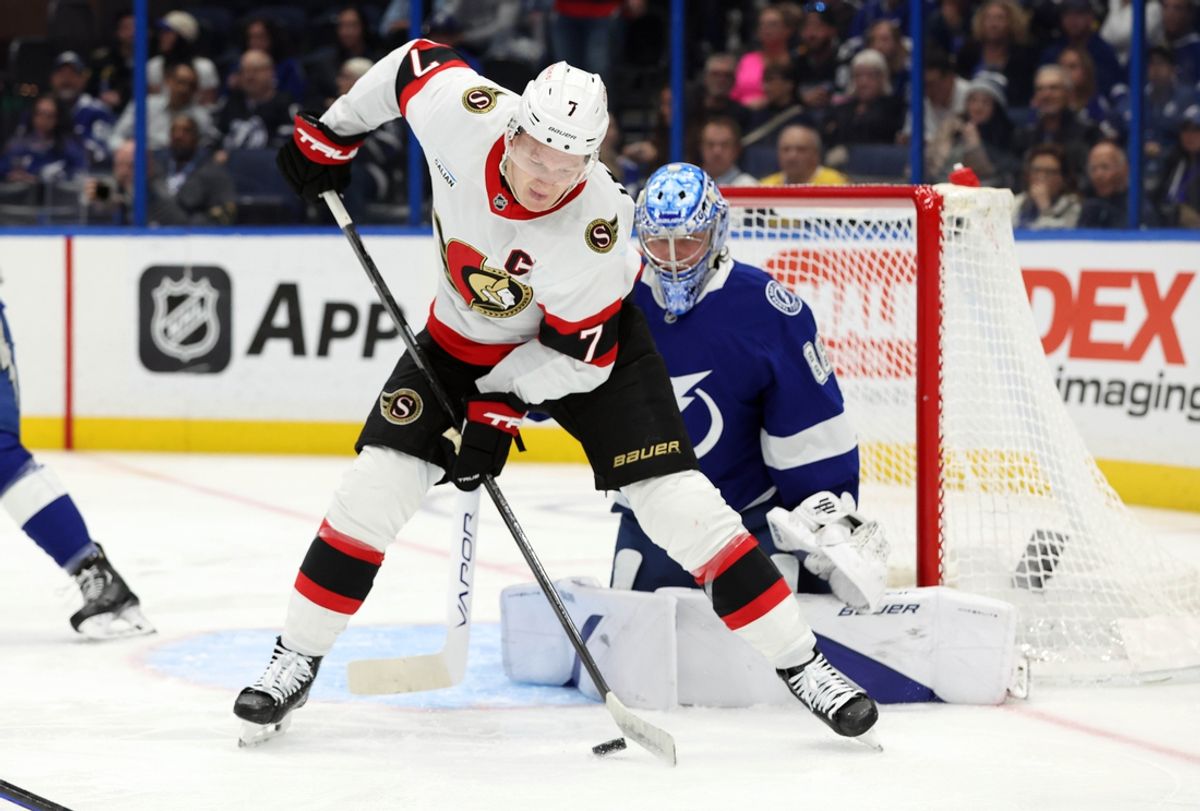 Feb 6, 2025; Tampa, Florida, USA; Ottawa Senators left wing Brady Tkachuk (7) shoots against Tampa Bay Lightning goaltender Andrei Vasilevskiy (88) during the second period at Amalie Arena. Mandatory Credit: Kim Klement Neitzel-Imagn Images