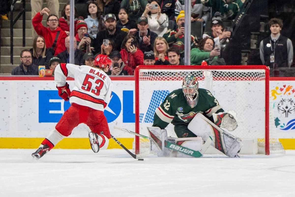 Feb 6, 2025; Saint Paul, Minnesota, USA; Minnesota Wild goaltender Filip Gustavsson (32) stops Carolina Hurricanes right wing Jackson Blake (53) on a penalty shot in the second period at Xcel Energy Center. Mandatory Credit: Matt Blewett-Imagn Images