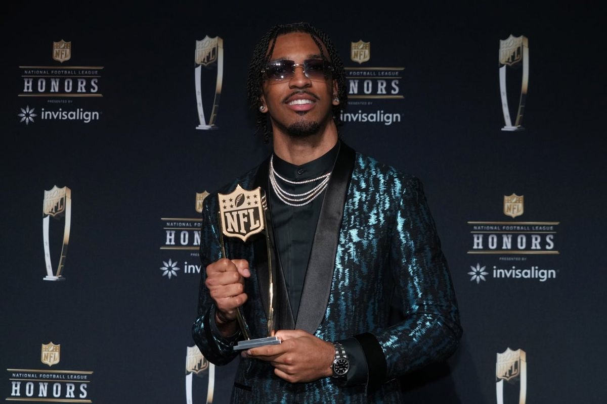 Feb 6, 2025; New Orleans, LA, USA; Washington Commanders quarterback Jayden Daniels poses with the Offensive Rookie of the Year award during Super Bowl LIX NFL Honors at Saenger Theatre. Mandatory Credit: Kirby Lee-Imagn Images