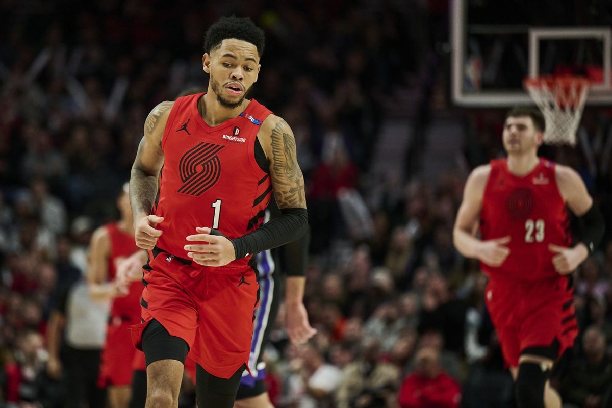 Feb 6, 2025; Portland, Oregon, USA; Portland Trail Blazers guard Anfernee Simons (1) runs back on defense after scoring a basket during the second half against the Sacramento Kings at Moda Center. Mandatory Credit: Troy Wayrynen-Imagn Images