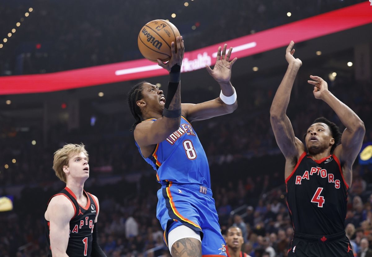 Feb 7, 2025; Oklahoma City, Oklahoma, USA; Oklahoma City Thunder forward Jalen Williams (8) goes up for a basket between Toronto Raptors guard Gradey Dick (1) and forward Scottie Barnes (4) during the first quarter at Paycom Center. Mandatory Credit: Alonzo Adams-Imagn Images
