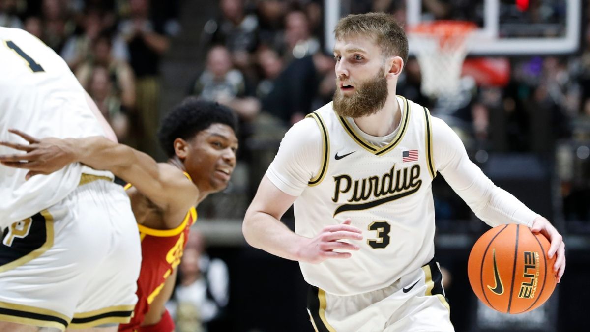 Purdue Boilermakers forward Caleb Furst (1) sets a pick on USC Trojans guard Isaiah Elohim (2) for Purdue Boilermakers guard Braden Smith (3) Friday, Feb. 7, 2025, during the NCAA men’s basketball game at Mackey Arena in West Lafayette, Ind. Purdue Boilermakers won 90-72.