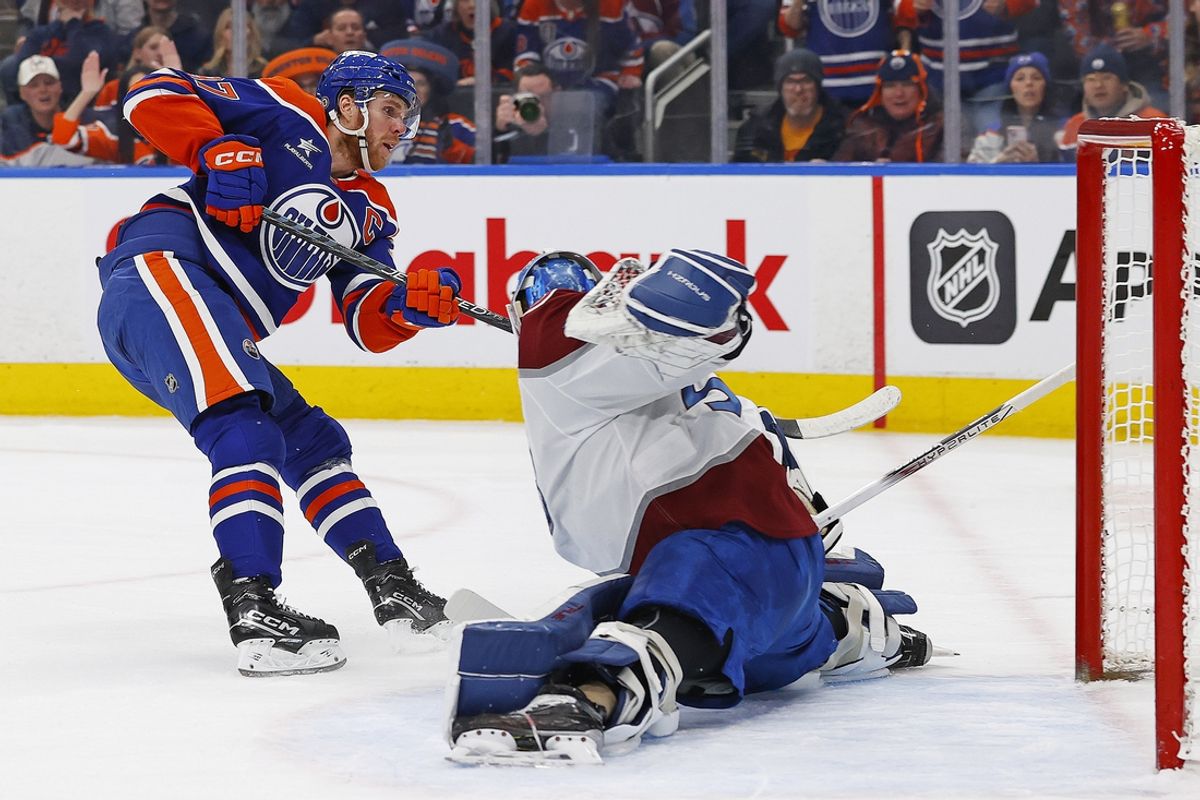 Feb 7, 2025; Edmonton, Alberta, CAN; Colorado Avalanche goaltender Mackenzie Blackwood (39) makes a save on Edmonton Oilers forward Connor McDavid (97) during the first period at Rogers Place. Mandatory Credit: Perry Nelson-Imagn Images