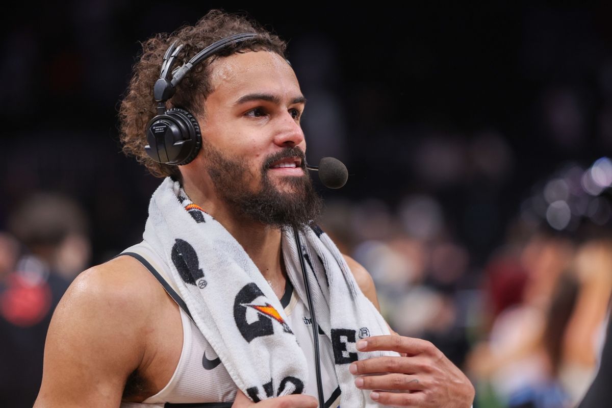 Feb 7, 2025; Atlanta, Georgia, USA; Atlanta Hawks guard Trae Young (11) does an interview after a victory against the Milwaukee Bucks in the fourth quarter at State Farm Arena. Mandatory Credit: Brett Davis-Imagn Images