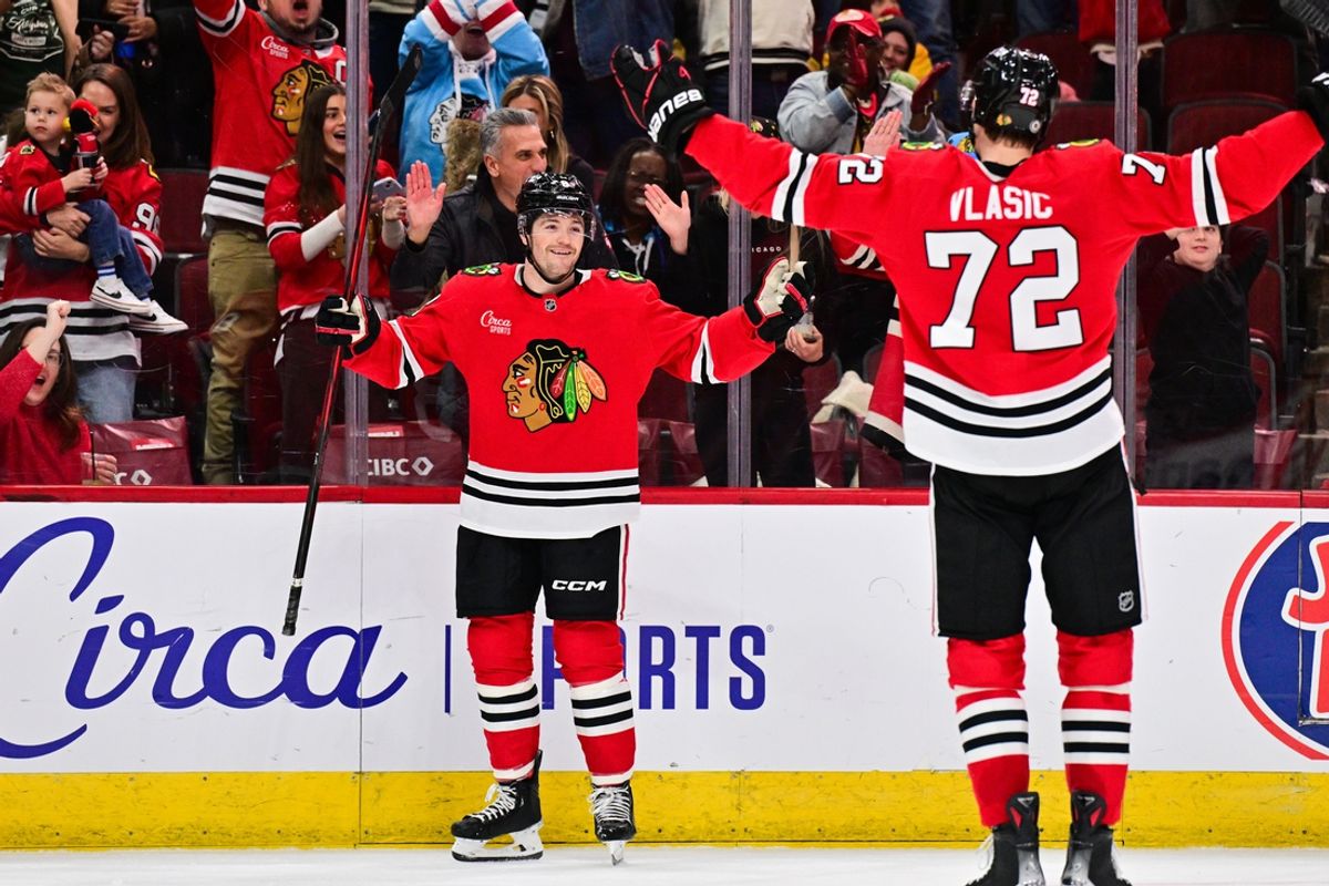 Feb 7, 2025; Chicago, Illinois, USA; Chicago Blackhawks center Ryan Donato (8) celebrates his goal against the Nashville Predators during the third period at the United Center. Mandatory Credit: Daniel Bartel-Imagn Images