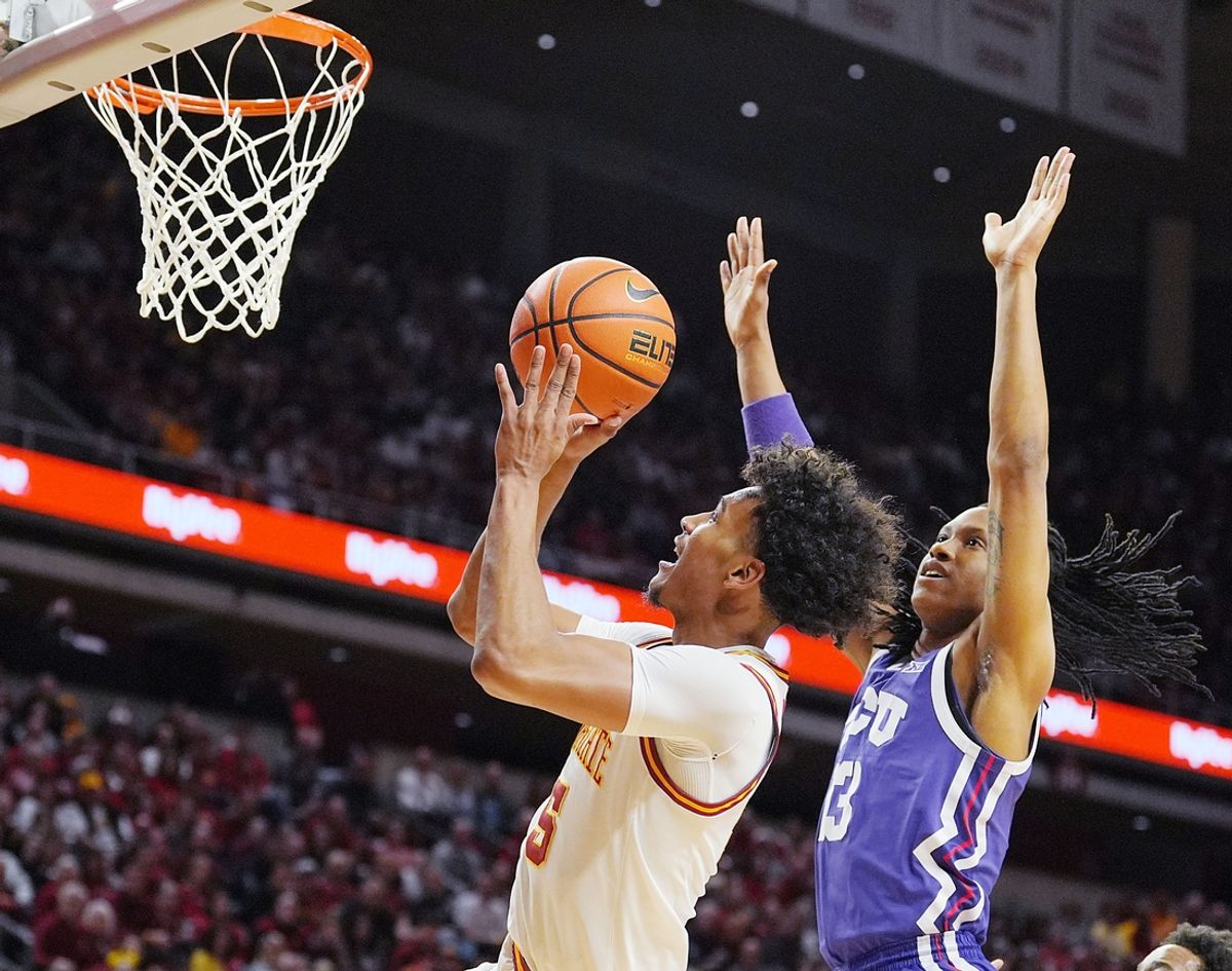 Iowa State Cyclones guard Curtis Jones (5) shoots the ball over aroundTCU Horned Frogs center Trazarien White (13) during the first half in the Big-12 men’s basketball at Hilton Coliseum on Feb 8, 2025 in Ames, Iowa.