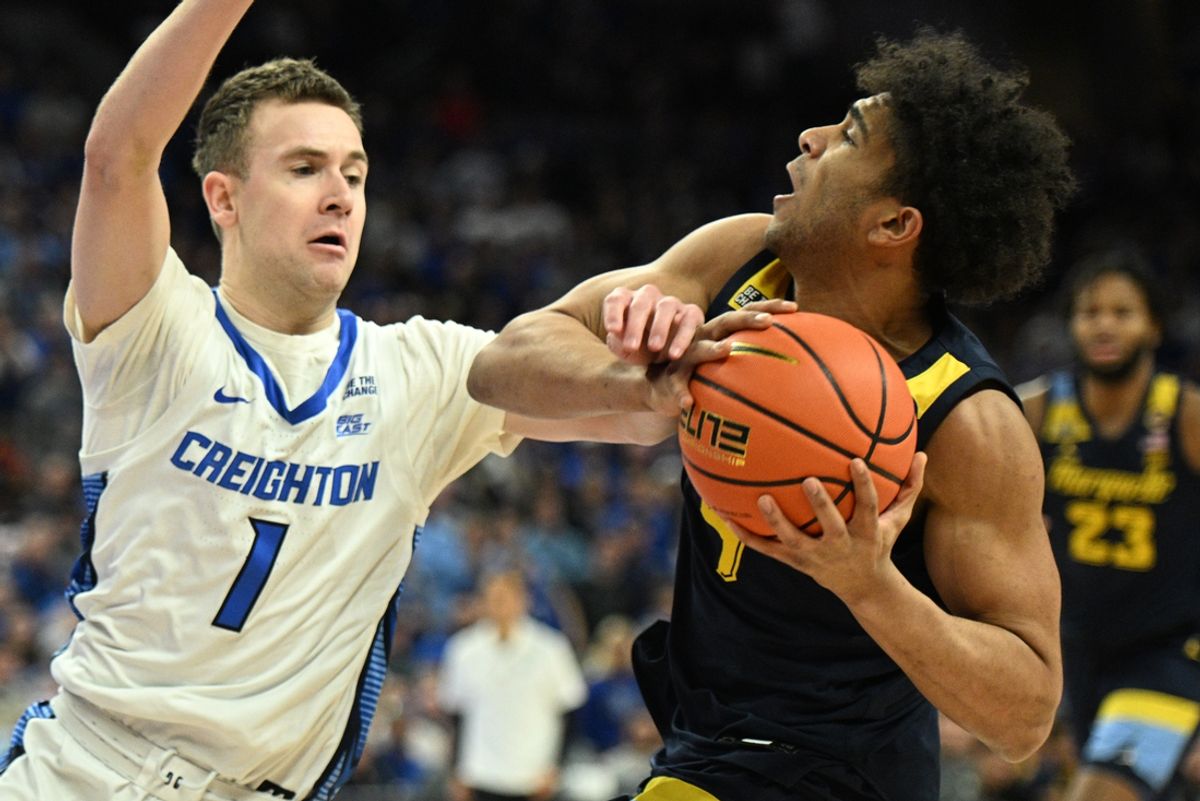Feb 8, 2025; Omaha, Nebraska, USA; Creighton Bluejays guard Steven Ashworth (1) defends against Marquette Golden Eagles guard Stevie Mitchell (4) in the first half at CHI Health Center Omaha. Mandatory Credit: Steven Branscombe-Imagn Images