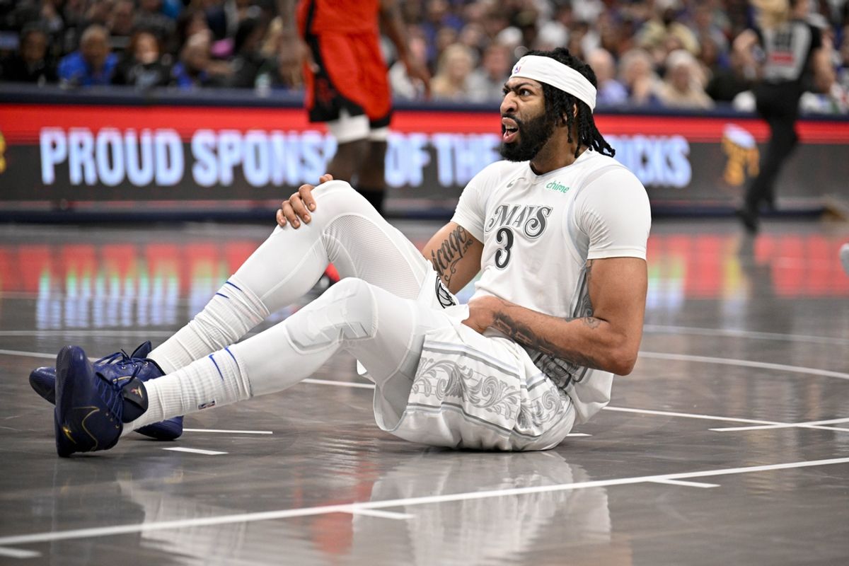 Feb 8, 2025; Dallas, Texas, USA; Dallas Mavericks forward Anthony Davis (3) falls to the court during the second quarter against the Houston Rockets at American Airlines Center. Mandatory Credit: Jerome Miron-Imagn Images