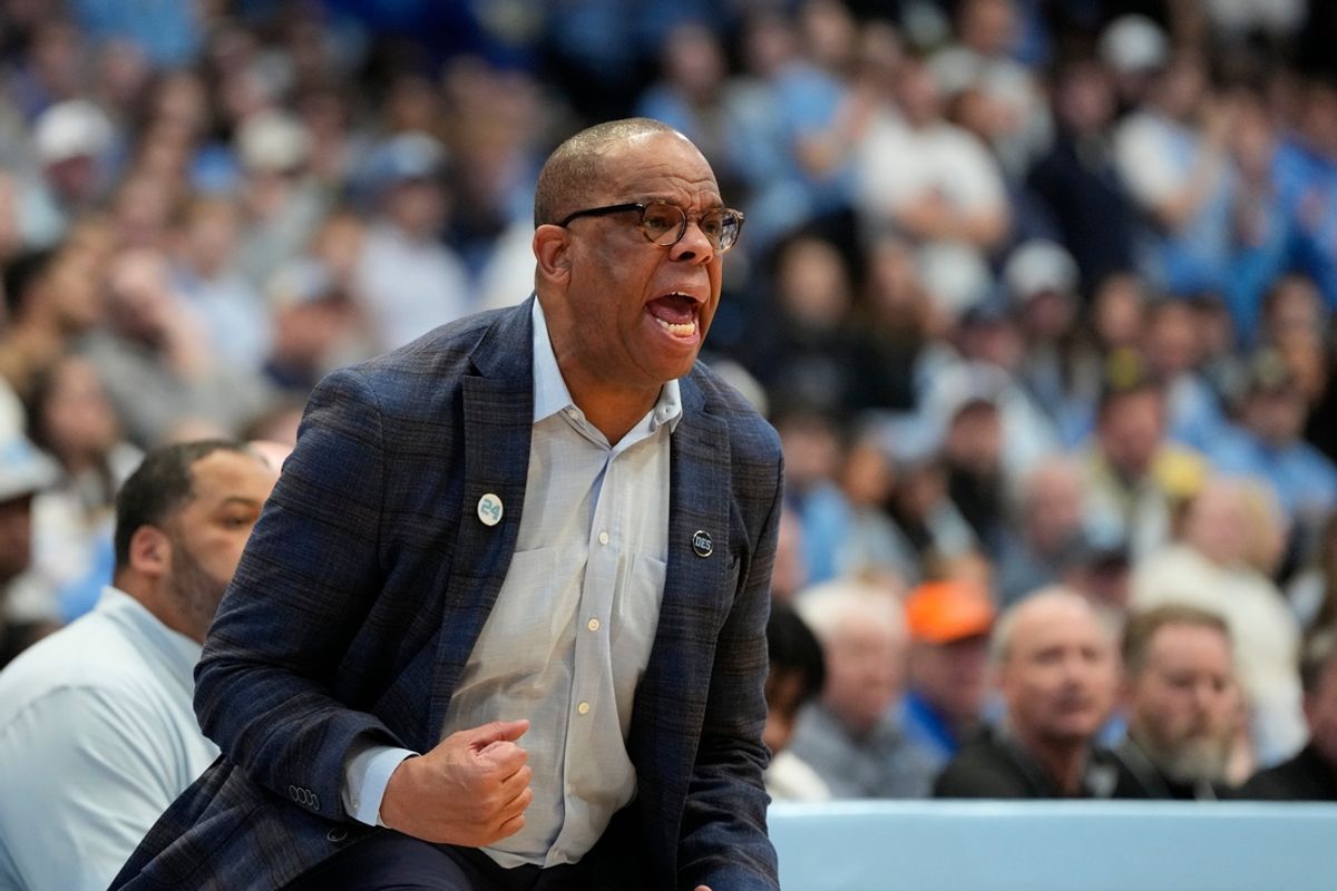Feb 8, 2025; Chapel Hill, North Carolina, USA;  North Carolina Tar Heels head coach Hubert Davis reacts in the first half at Dean E. Smith Center. Mandatory Credit: Bob Donnan-Imagn Images