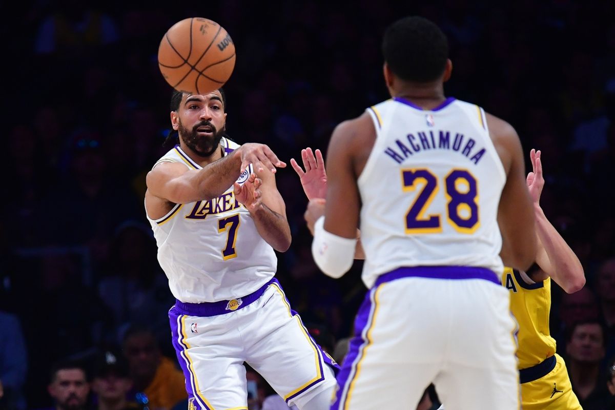 Feb 8, 2025; Los Angeles, California, USA; Los Angeles Lakers guard Gabe Vincent (7) passes the ball to forward Rui Hachimura (28) during the first half at Crypto.com Arena. Mandatory Credit: Gary A. Vasquez-Imagn Images