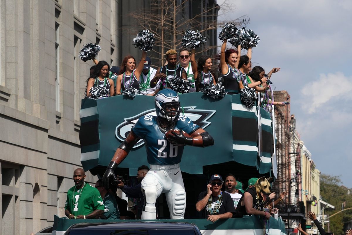 Feb 8, 2025; New Orleans, LA, USA; The Philadelphia Eagles float with figurine of running back Saquon Barkley (26) during the Super Bowl LIX  Host Committee Parade. Mandatory Credit: Kirby Lee-Imagn Images