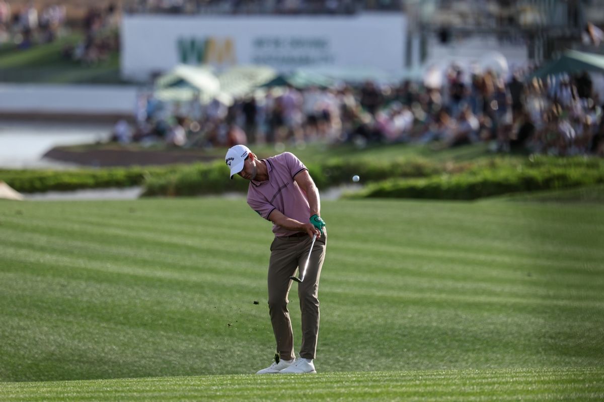 Feb 8, 2025; Scottsdale, Arizona, USA; Thomas Detry of Belgium hits his ball towards the 18th hole during the third round of the WM Phoenix Open golf tournament. Mandatory Credit: Aryanna Frank-Imagn Images