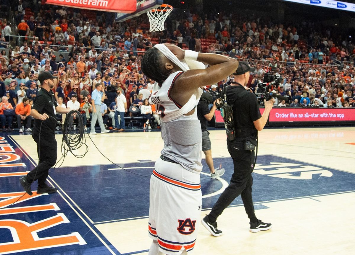 Auburn Tigers guard Miles Kelly (13) reacts after the game as Auburn Tigers take on Florida Gators at Neville Arena in Auburn, Ala., on Saturday, Feb. 8, 2025. Florida Gators defeated Auburn Tigers 90-81.