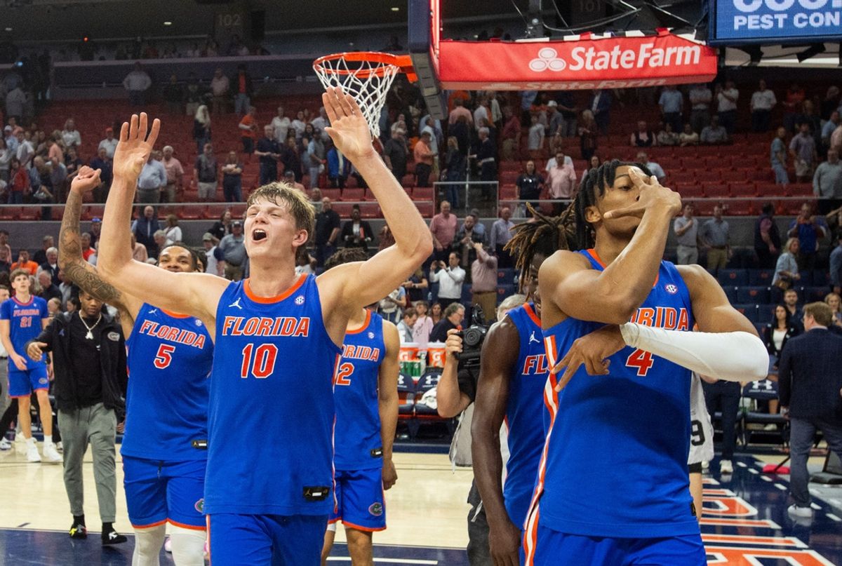 Florida Gators players acknowledge fans as they walk off the court as Auburn Tigers take on Florida Gators at Neville Arena in Auburn, Ala., on Saturday, Feb. 8, 2025. Florida Gators defeated Auburn Tigers 90-81.