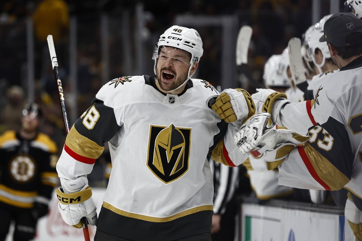 Feb 8, 2025; Boston, Massachusetts, USA; Vegas Golden Knights center Tomas Hertl (48) smiles celebrates at the bench after scoring the winning goal during the third period of their 4-3 win over the Boston Bruins at TD Garden. Mandatory Credit: Winslow Townson-Imagn Images