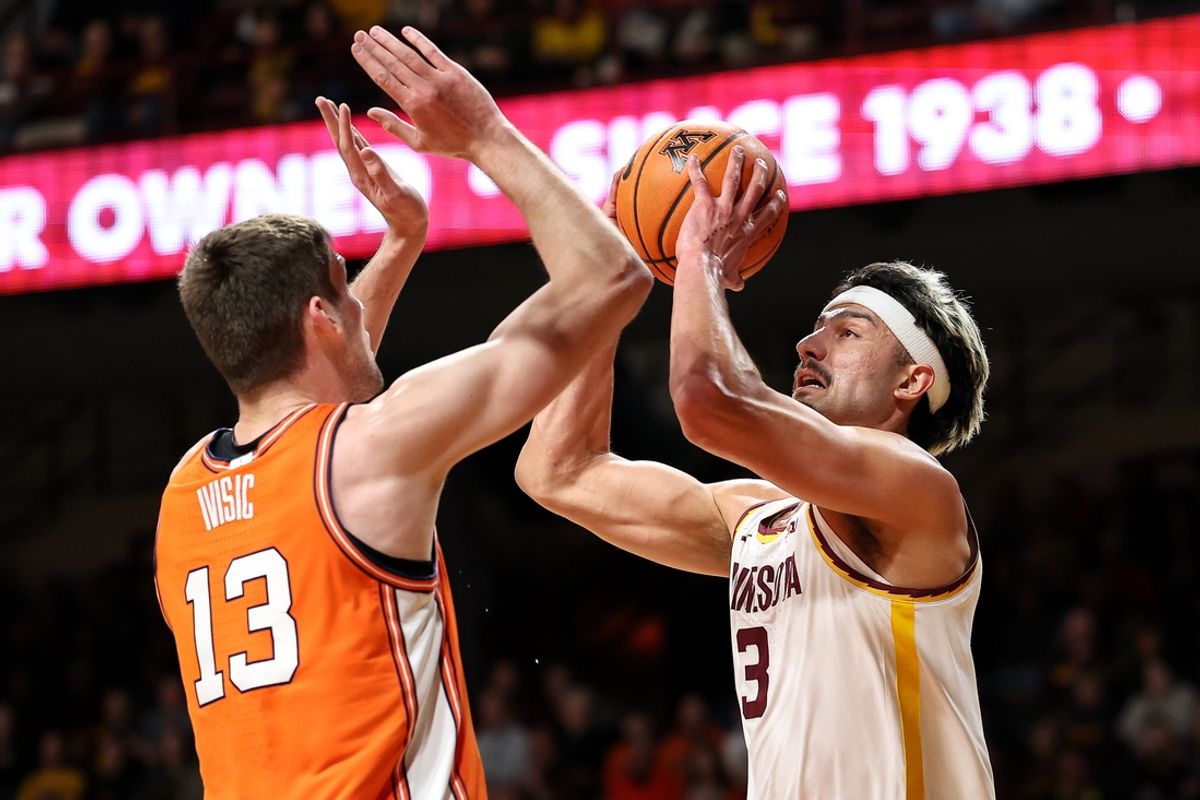 Feb 8, 2025; Minneapolis, Minnesota, USA; Minnesota Golden Gophers forward Dawson Garcia (3) shoots as Illinois Fighting Illini center Tomislav Ivisic (13) defends during the first half at Williams Arena. Mandatory Credit: Matt Krohn-Imagn Images