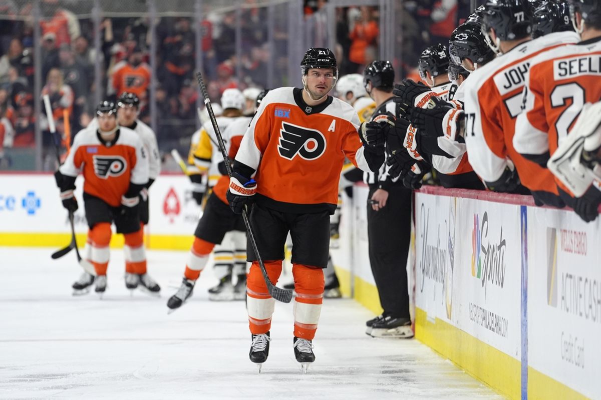 Feb 8, 2025; Philadelphia, Pennsylvania, USA; Philadelphia Flyers center Scott Laughton (21) celebrates with teammates after scoring a goal against the Pittsburgh Penguins in the first period at Wells Fargo Center. Mandatory Credit: Kyle Ross-Imagn Images