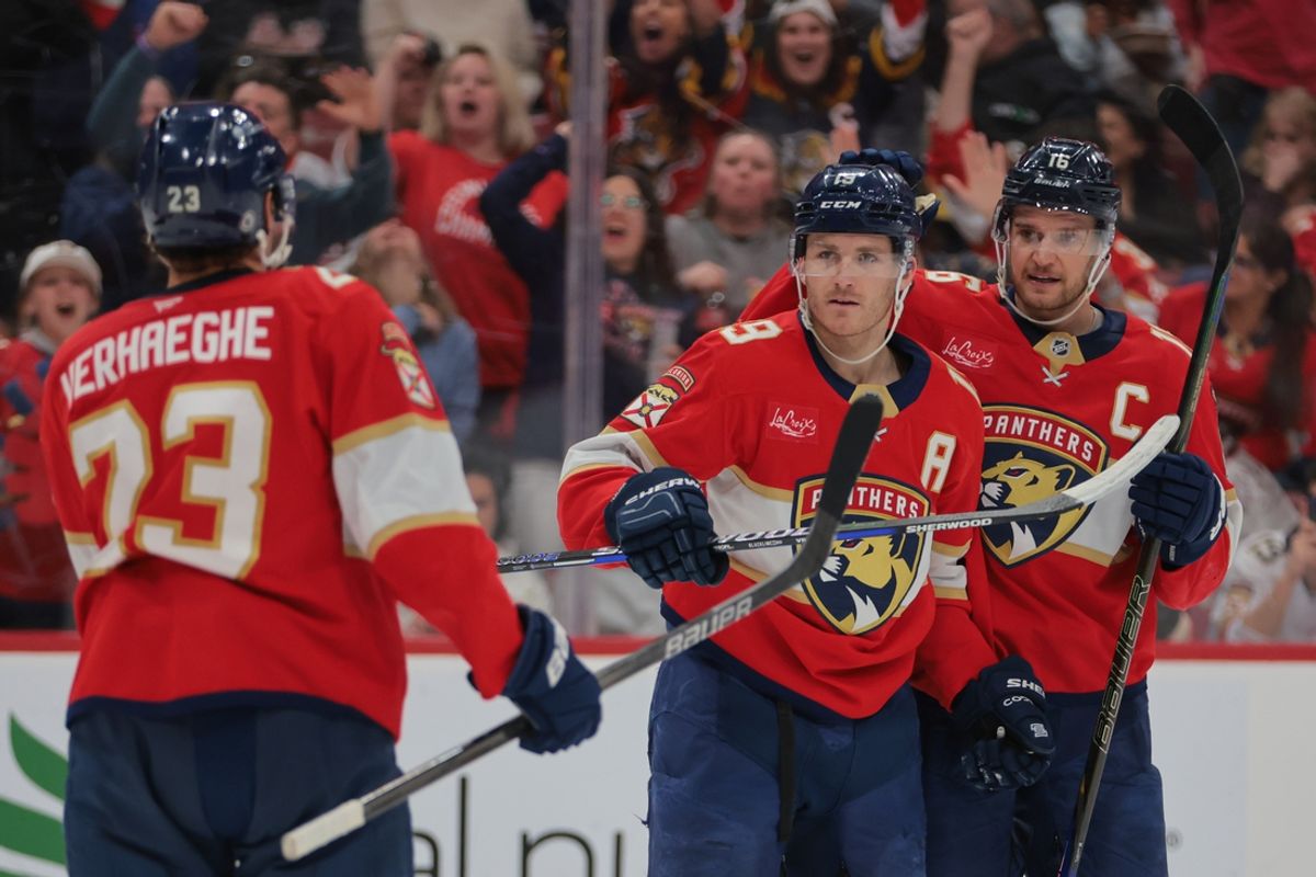 Feb 8, 2025; Sunrise, Florida, USA; Florida Panthers left wing Matthew Tkachuk (19) celebrates with center Aleksander Barkov (16) and center Carter Verhaeghe (23) after scoring against the Ottawa Senators during the second period at Amerant Bank Arena. Mandatory Credit: Sam Navarro-Imagn Images