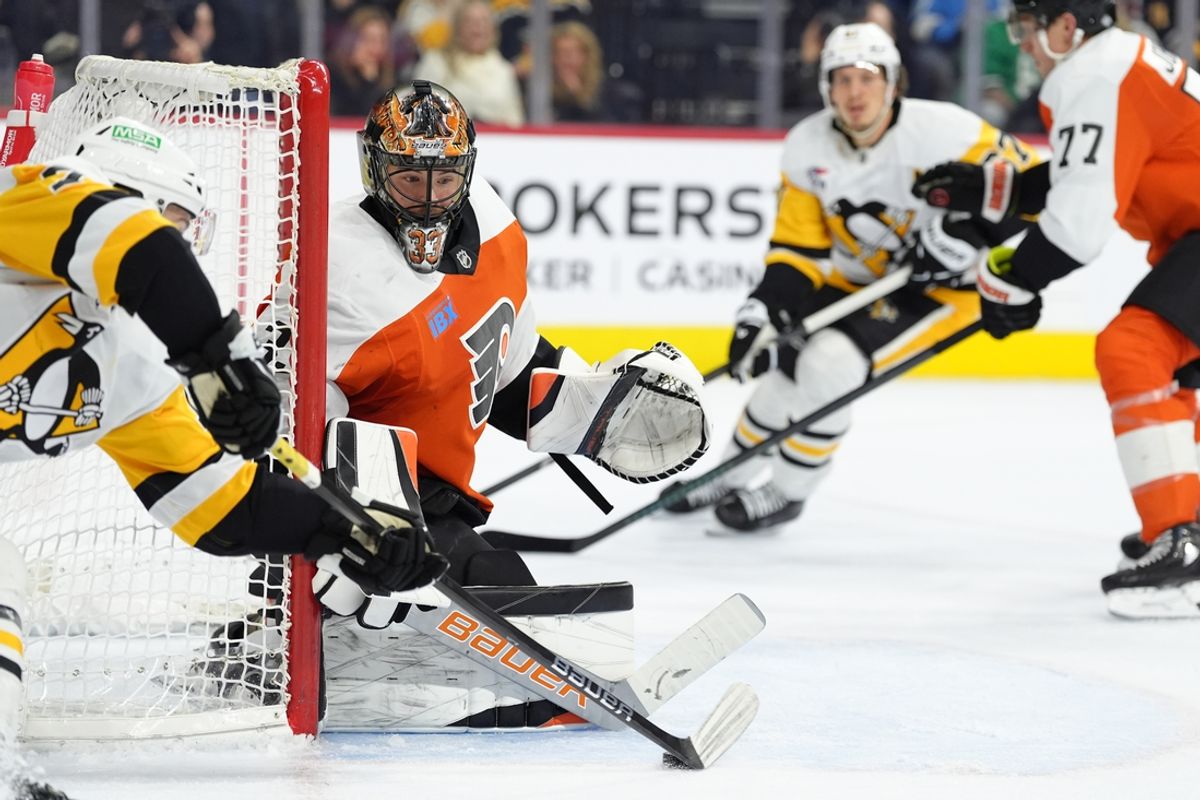 Feb 8, 2025; Philadelphia, Pennsylvania, USA; Philadelphia Flyers goalie Samuel Ersson (33) makes a save against Pittsburgh Penguins left wing Anthony Beauvillier (72) in the third period at Wells Fargo Center. Mandatory Credit: Kyle Ross-Imagn Images
