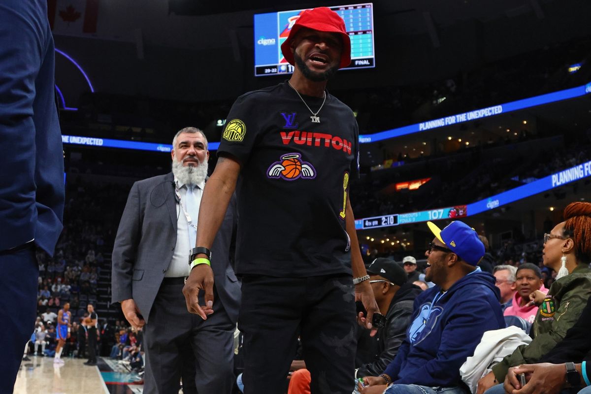 Feb 8, 2025; Memphis, Tennessee, USA; Tee Morant, father of Memphis Grizzlies guard Ja Morant (12) reacts as he is escorted by security off the court during the fourth quarter against the Oklahoma City Thunder at FedExForum. Mandatory Credit: Petre Thomas-Imagn Images