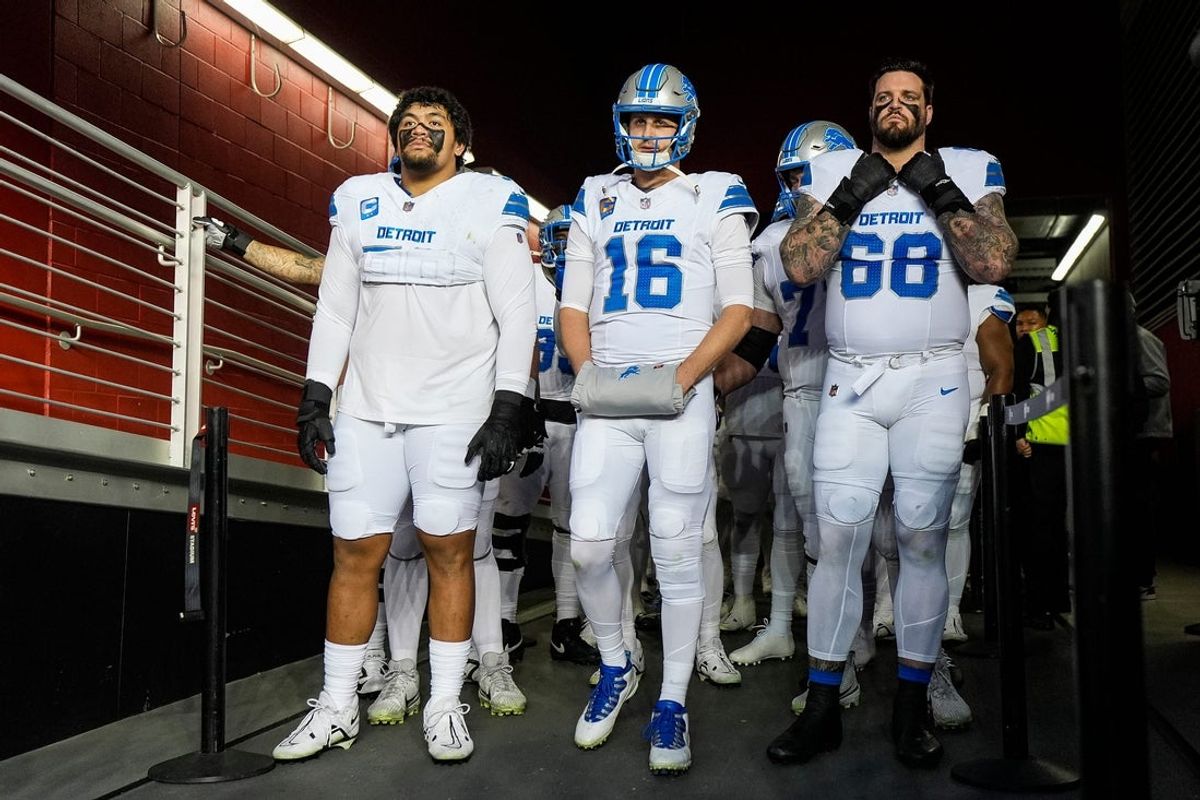 From left, Detroit Lions offensive tackle Penei Sewell (58), quarterback Jared Goff (16) and offensive tackle Taylor Decker (68), ready to take the field against the San Francisco 49ers at Levi's Stadium in Santa Clara, Calif. on Monday, Dec. 30, 2024.