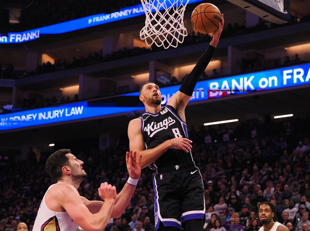 Feb 8, 2025; Sacramento, California, USA; Sacramento Kings guard Zach LaVine (8) scores above New Orleans Pelicans forward Karlo Matkovic (17) during the second quarter at Golden 1 Center. Mandatory Credit: Kelley L Cox-Imagn Images