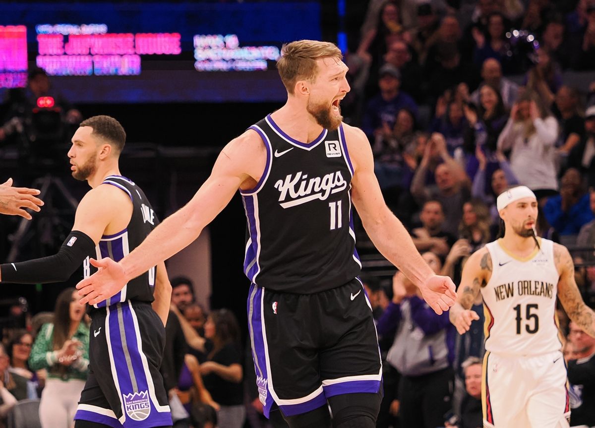 Feb 8, 2025; Sacramento, California, USA; Sacramento Kings center Domantas Sabonis (11) celebrates with teammates after a play against the New Orleans Pelicans during the fourth quarter at Golden 1 Center. Mandatory Credit: Kelley L Cox-Imagn Images