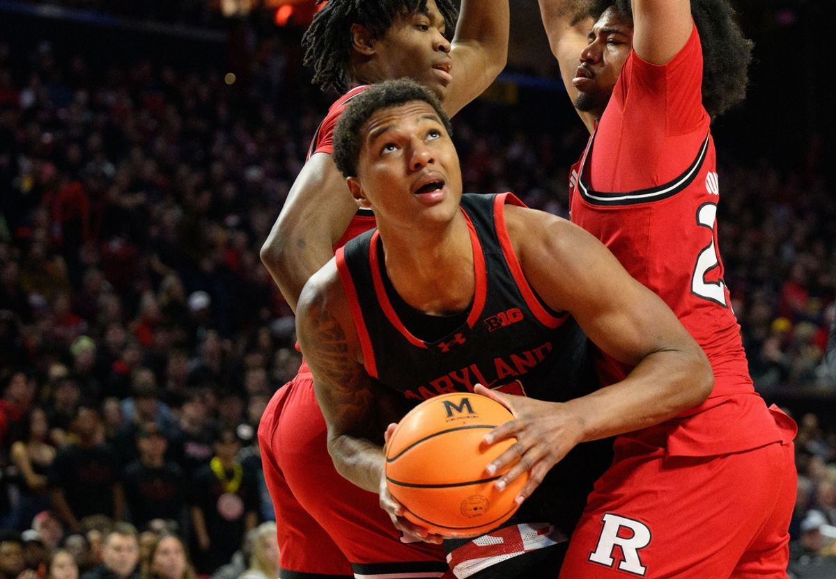 Feb 9, 2025; College Park, Maryland, USA; Maryland Terrapins forward Julian Reese (10) drives to the basket against Rutgers Scarlet Knights guard Jeremiah Williams (25) during the second half at Xfinity Center. Mandatory Credit: Reggie Hildred-Imagn Images