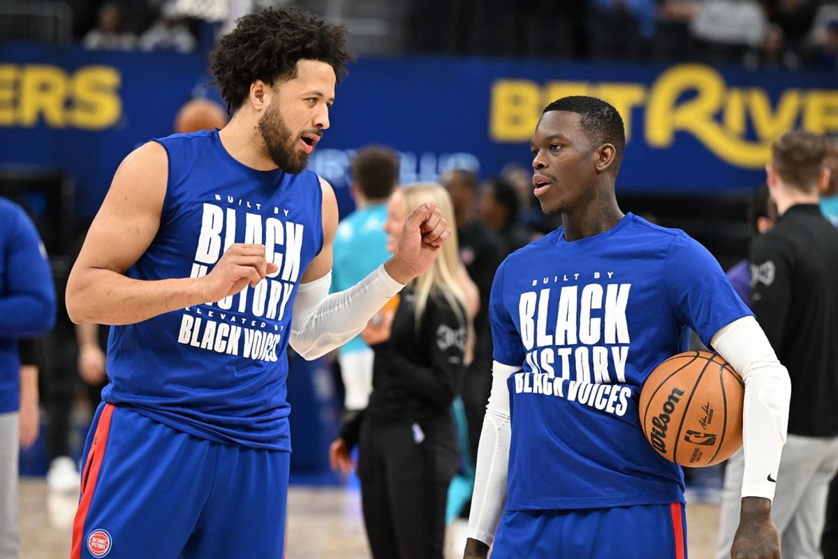Feb 9, 2025; Detroit, Michigan, USA; Detroit Pistons guard Cade Cunningham (2) talks to newly acquired Pistons guard, Dennis Schroder (right) during pregame warmups before their game against the Charlotte Hornets at Little Caesars Arena. Mandatory Credit: Lon Horwedel-Imagn Images