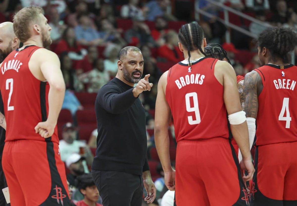 Feb 9, 2025; Houston, Texas, USA; Houston Rockets head coach Ime Udoka talks with players during the fourth quarter against the Toronto Raptors at Toyota Center. Mandatory Credit: Troy Taormina-Imagn Images