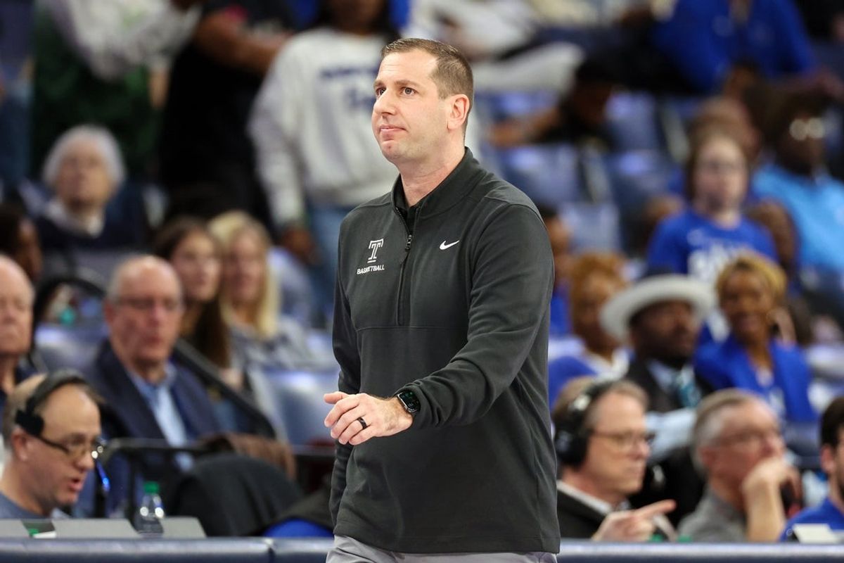Feb 9, 2025; Memphis, Tennessee, USA; Temple Owls head coach Adam Fisher looks on against the Memphis Tigers during the first half at FedExForum. Mandatory Credit: Wesley Hale-Imagn Images