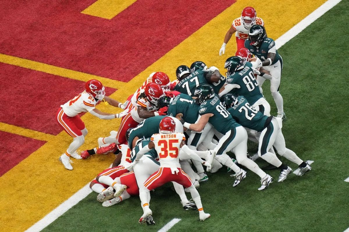 Feb 9, 2025; New Orleans, LA, USA; Philadelphia Eagles quarterback Jalen Hurts (1) rushes the ball for a touchdown against the Kansas City Chiefs during the first quarter in Super Bowl LIX at Caesars Superdome. Mandatory Credit: Kirby Lee-Imagn Images