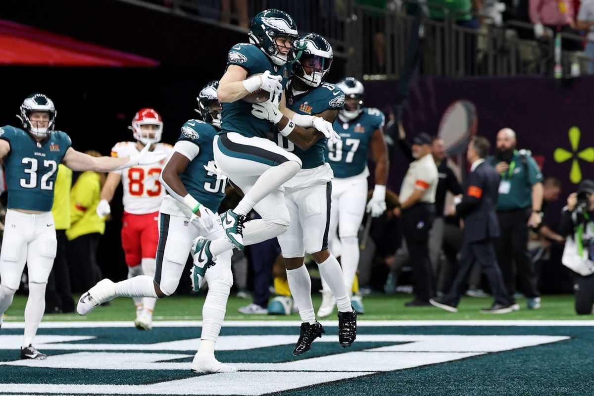 Feb 9, 2025; New Orleans, LA, USA; Philadelphia Eagles cornerback Cooper DeJean (33) celebrates with teammates after returning an interception for a touchdown against the Kansas City Chiefs during the first half of Super Bowl LIX at Caesars Superdome. Mandatory Credit: Geoff Burke-Imagn Images