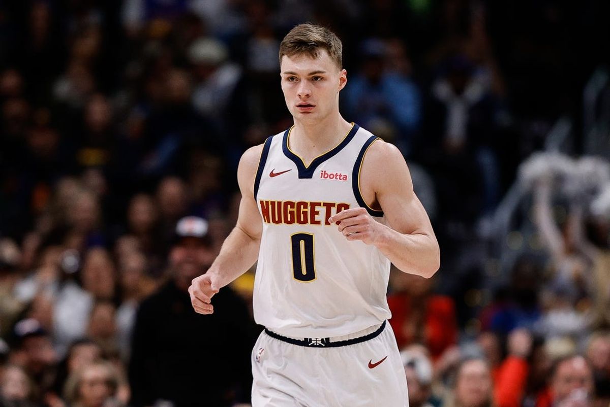 Feb 10, 2025; Denver, Colorado, USA; Denver Nuggets guard Christian Braun (0) after a play in the first quarter against the Portland Trail Blazers at Ball Arena. Mandatory Credit: Isaiah J. Downing-Imagn Images