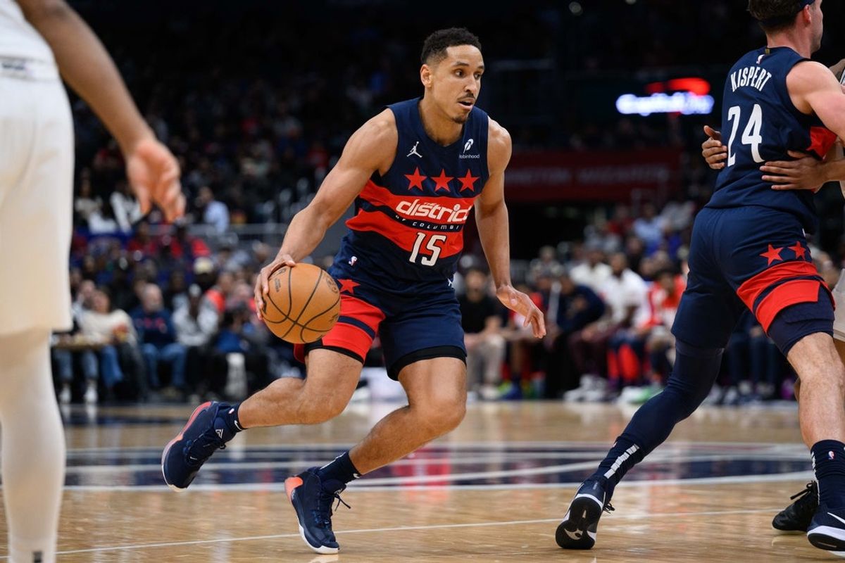 Feb 10, 2025; Washington, District of Columbia, USA; Washington Wizards guard Malcolm Brogdon (15) handles the ball during the first quarter against the San Antonio Spurs at Capital One Arena. Mandatory Credit: Reggie Hildred-Imagn Images