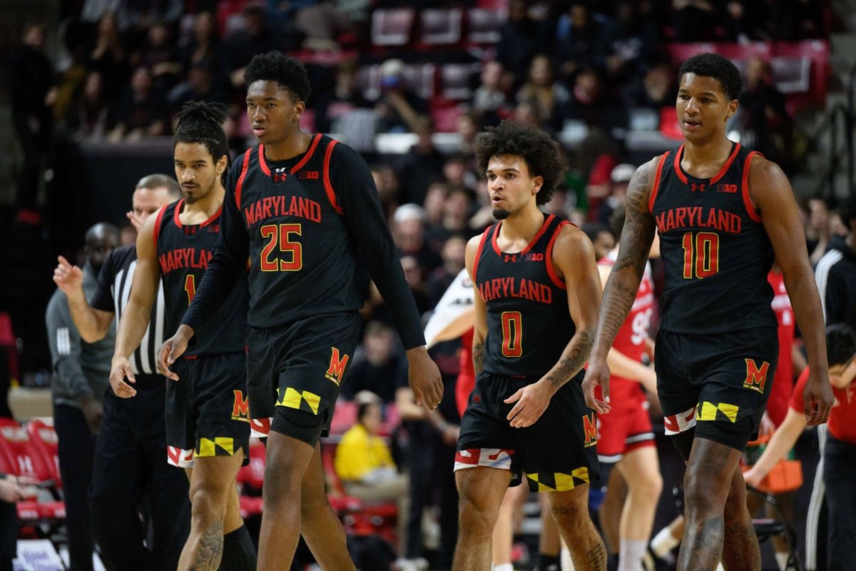Feb 9, 2025; College Park, Maryland, USA; Maryland Terrapins guard Rodney Rice (1), center Derik Queen (25), guard Ja'Kobi Gillespie (0), and forward Julian Reese (10) walk to the bench during the first half against the Rutgers Scarlet Knights at Xfinity Center. Mandatory Credit: Reggie Hildred-Imagn Images