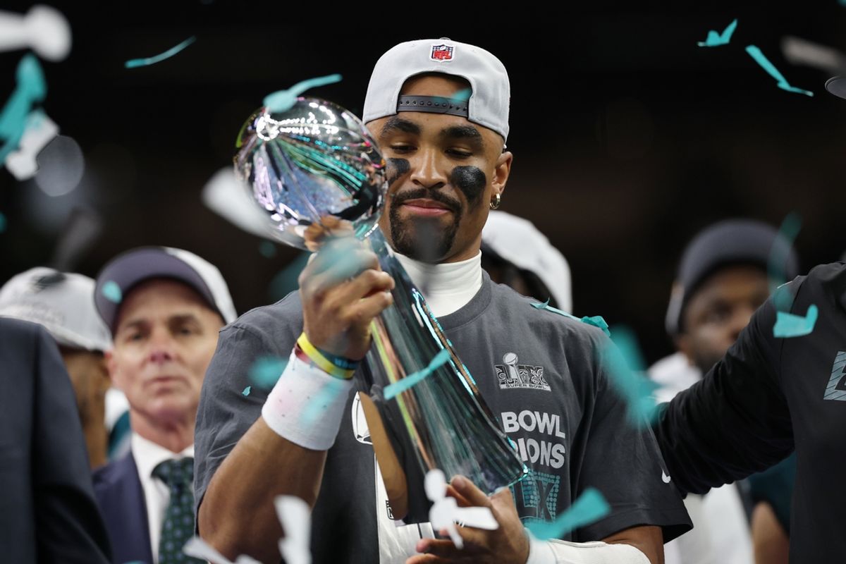 Feb 9, 2025; New Orleans, LA, USA; Philadelphia Eagles quarterback Jalen Hurts holds the Lombardi Trophy during the championship trophy presentation after the Eagles' game against the Kansas City Chiefs in Super Bowl LIX at Caesars Superdome. Mandatory Credit: Geoff Burke-Imagn Images