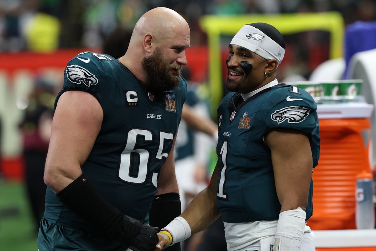 Feb 9, 2025; New Orleans, LA, USA; Philadelphia Eagles quarterback Jalen Hurts (1) celebrates with Eagles offensive tackle Lane Johnson (65) on the bench during the fourth quarter of Super Bowl LIX against the Kansas City Chiefs at Caesars Superdome. Mandatory Credit: Geoff Burke-Imagn Images