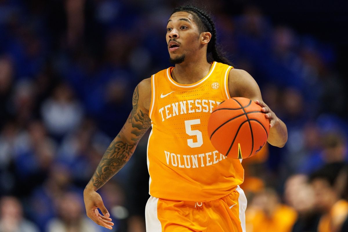 Feb 11, 2025; Lexington, Kentucky, USA; Tennessee Volunteers guard Zakai Zeigler (5) brings the ball up court during the first half against the Kentucky Wildcats at Rupp Arena at Central Bank Center. Mandatory Credit: Jordan Prather-Imagn Images