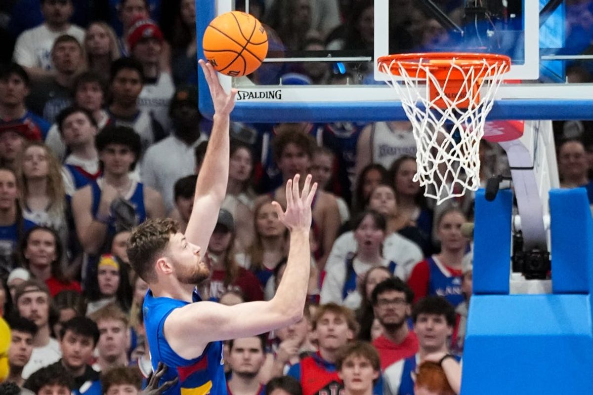 Feb 11, 2025; Lawrence, Kansas, USA; Kansas Jayhawks center Hunter Dickinson (1) scores against the Colorado Buffaloes during the first half at Allen Fieldhouse. Mandatory Credit: Denny Medley-Imagn Images