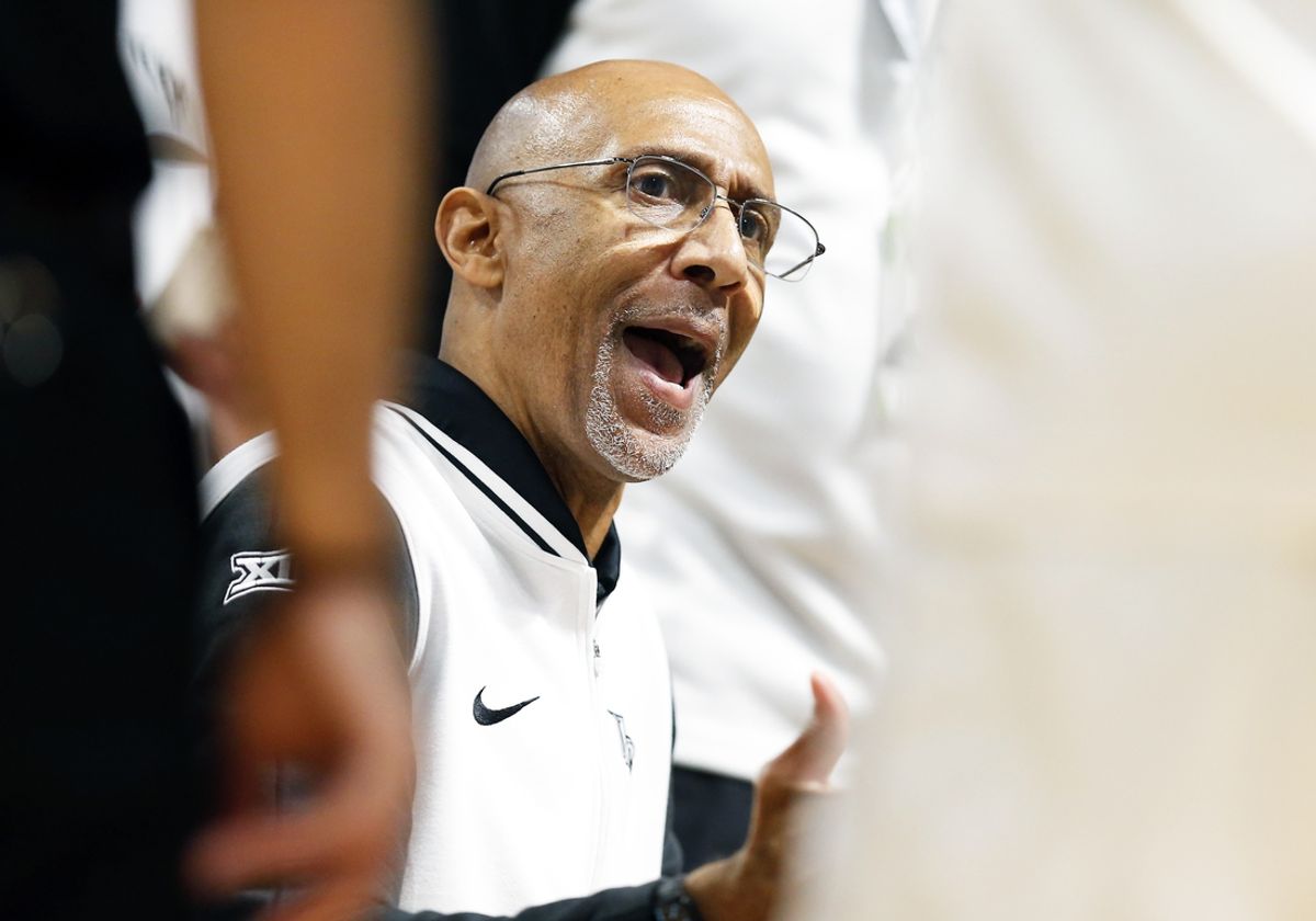 Feb 11, 2025; Orlando, Florida, USA; Central Florida Knights head coach Johnny Dawkins talks to his players during a timeout against the Iowa State Cyclones at Addition Financial Arena. Mandatory Credit: Russell Lansford-Imagn Images
